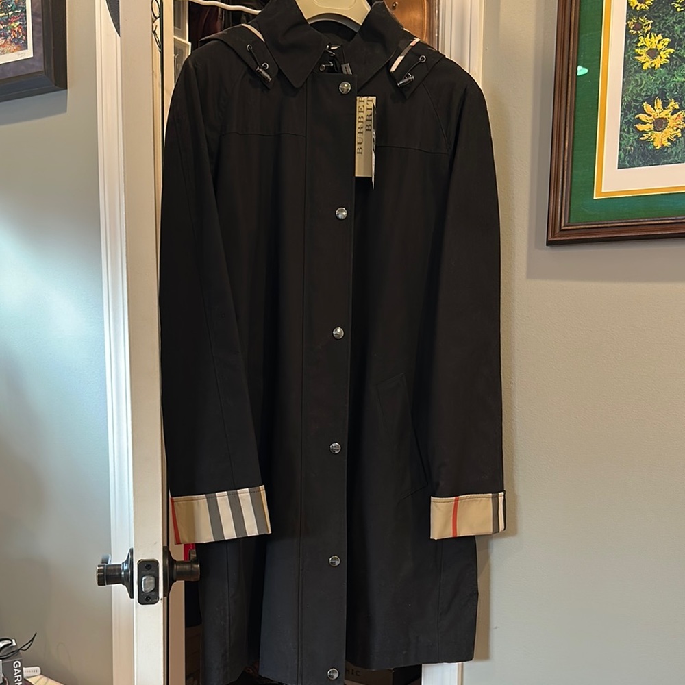 New Elegant Black Trench Coat with Stripe Accents and zip out liner.